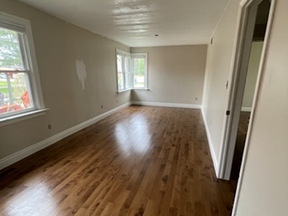Bright interior repaint with hardwood floors