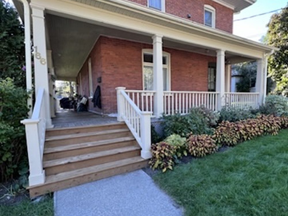 Brick home with repainted porch and trim